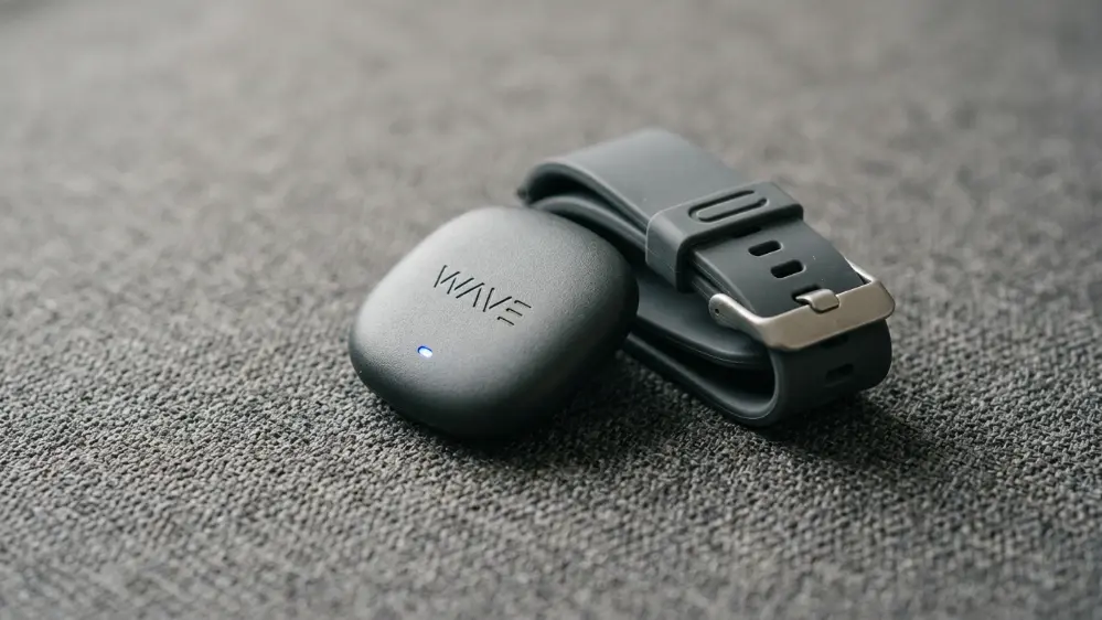 Fitbit Air pebble tracker with fabric band close up